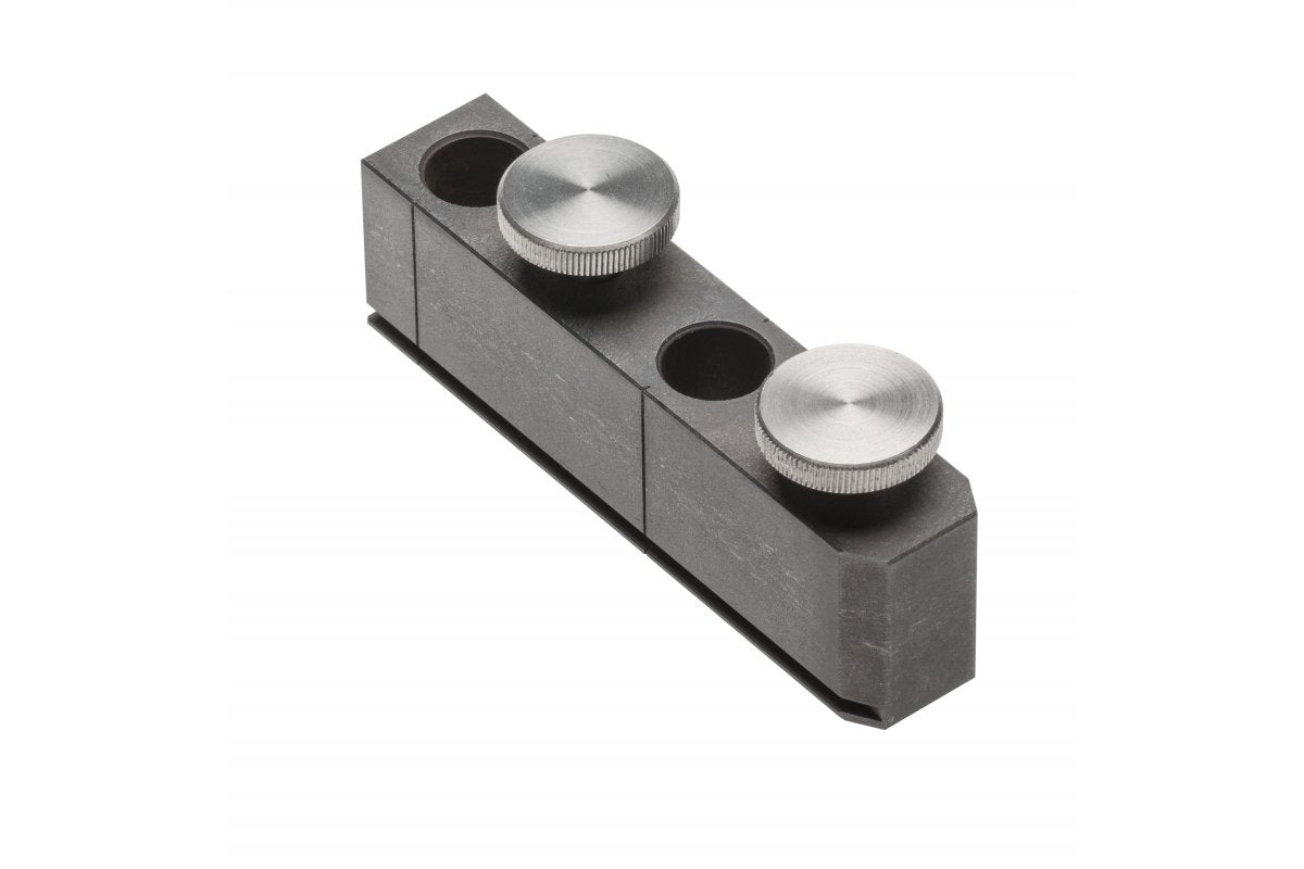 Hand-held drilling tool with clamping
